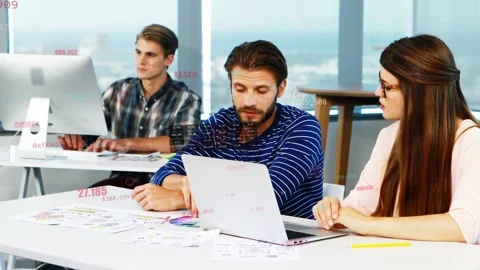 Lead man taking sheet after woman reaching, reviewing color for design with data Stock Footage 333704995