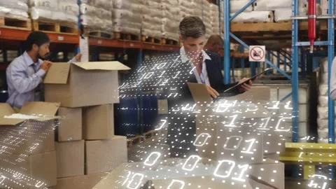 Lead opening box tapping tablet at pack station, activating data grid while team Stock Footage 333733678
