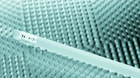 Lead pencil against a crosshatch background Stock Footage 21301436
