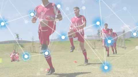 Lead player running on field following cones, lifting knee, training soccer Stock Footage 333277994