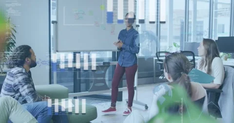 Lead pointing at board briefing animated bars code overlaying team asking Stock Footage 333893719