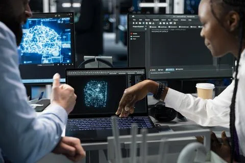 Lead programmer and female engineer in data center update AI automation scripts Foto stock