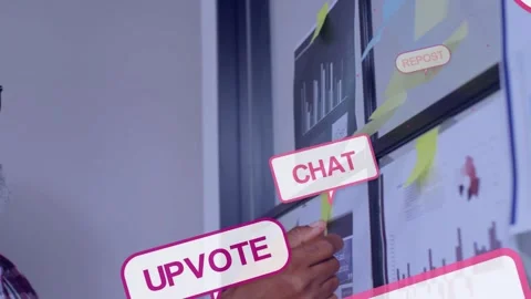 Lead scanning charts then adding postits while mapping business data as UPVOTE Stock Footage 333609943