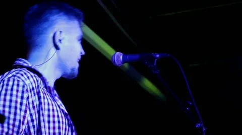 Lead singer performs on stage closeup Stock Footage 45392094