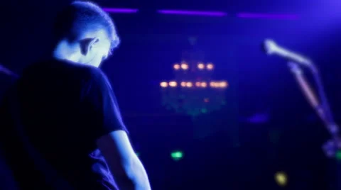 Lead singer performs on stage Stock Footage 45391976