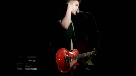 Lead singer performs on stage Stock Footage 45392289