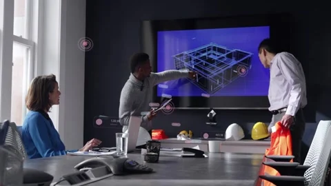 Lead tapping tablet showing UI tags, pointing to 3D model, engineer entering Stock Footage 333396684