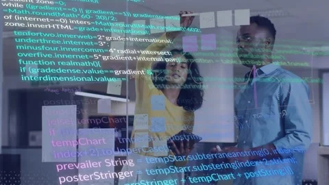 Lead using tablet, arranging glass notes, dev pointing, scrolling code overlay Stock Footage 332428364