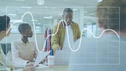 Lead walking up to table, leaning on laptop and explaining data for design, Stock Footage 333602750