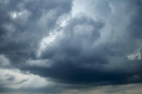 Leaden sky covered with cumulus clouds Stock Photos