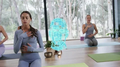Leader placing hands, initiating rotating blue wireframe head anchoring near her Stock Footage 333413751