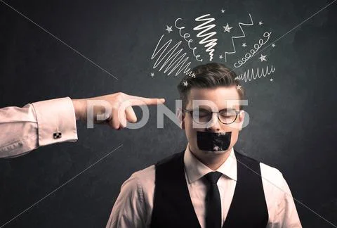 Leader pointing at employee Stock Photos