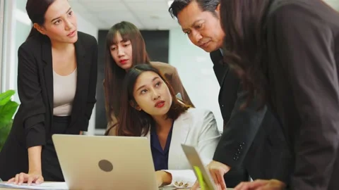 Leader proposing problem solution strategy to coworkers Stock Footage 165633681