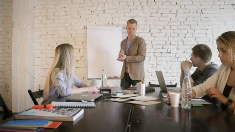 The leader of the team finished the presentation of the project for the business Stock Footage 90488070