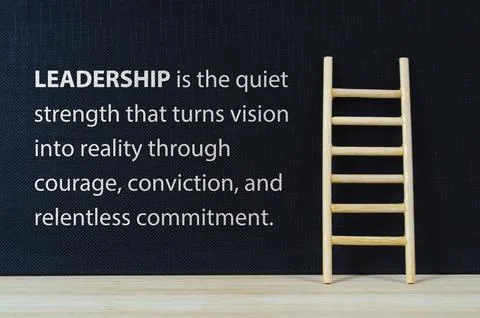 LEADERSHIP concept with endless commitment text on black cover background. Stock Photos