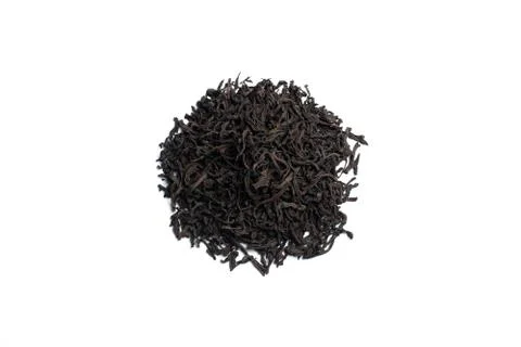 Leaf black tea, isolated on the white background Stock Photos