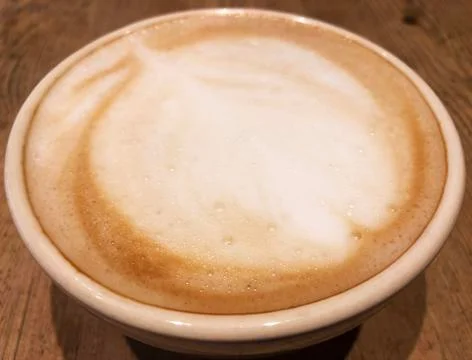 Leaf Foam In Cafe Latte Foto stock
