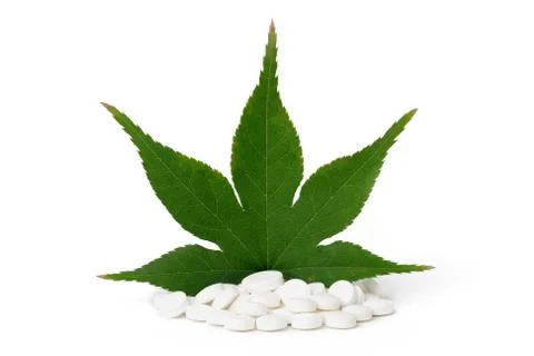 Leaf on pills Stock Photos