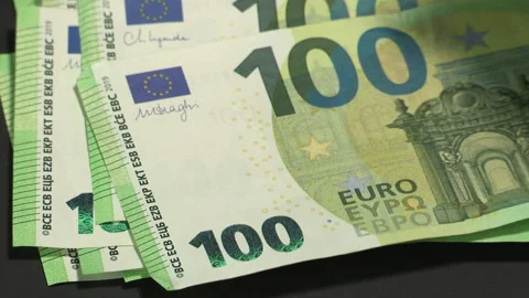 Leaf through 100 EURO banknotes on a black background - 42-2 Stock Footage 219692843