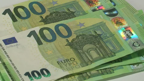 Leaf through 100 EURO banknotes on a white background - 36-4 Stock Footage 219693606