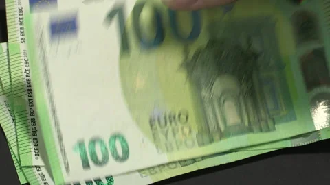 Leaf through 100 EURO banknotes on a black background - 43-2 Stock Footage 219694166