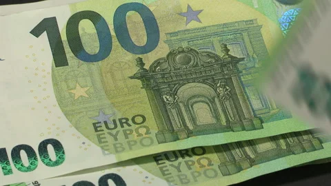 Leaf through 100 EURO banknotes, on a black background Stock Footage 219694283