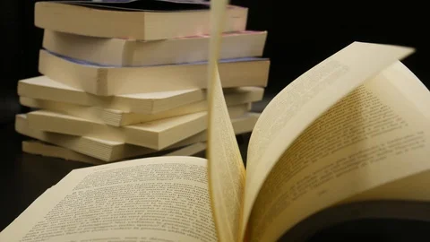 Leaf through a book 库存影片 128169445