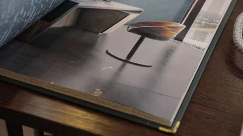 Leaf through the catalog of wallpapers for walls Stock Footage 113787207