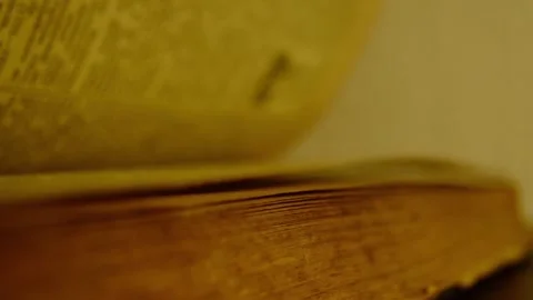 Leaf through the pages of an old and thick book Stock Footage 87918770