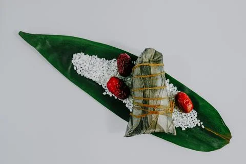 Leaf-wrapped rice dumpling with red dates Stock Photos