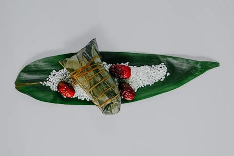 Leaf wrapped rice dumpling with red dates Stock Photos