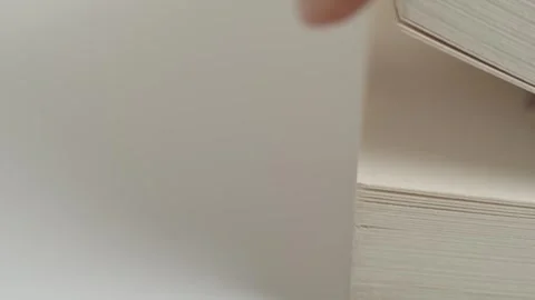 Leafing through a book. Flicking through old book pages, close-up.  Turning.. Stock Footage 262417024