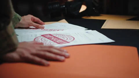 Leafing Through Top Secret Documents Video stock 243737349