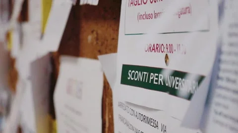 Leaflet on a university bulletin board Stock Footage 63089945