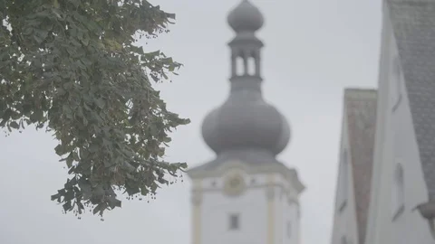 Leafs in front of church tower Video stock 74697966