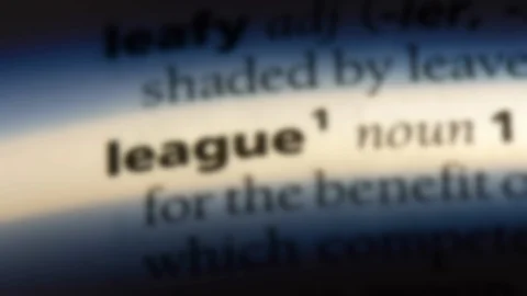 League word in a dictionary. Stock Footage 99562124