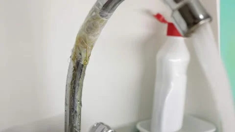 Leak from a crack in an old mixer Stock Footage 155840057
