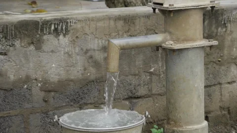 Leak from Hand Pump in India Video stock 320930974
