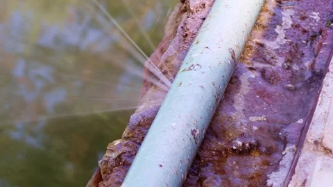 Leaking broken plumbing pipe of the heating system, water splashing Stock Footage 264093008