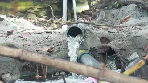 Leaking drain pipe and water spilling carelessly Stock Footage 213116470