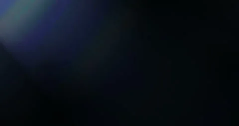 Leaking Reflection of a Defocused Shining Colourfully on a Black Background Stock Footage 91739982