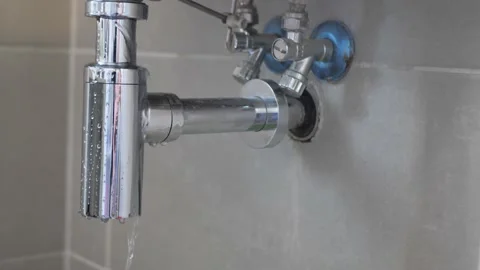 Leaking sink trap. broken siphon. sewage water leakage Stock Footage 170319475