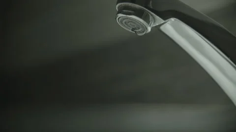 Leaking tap. Dripping water drop by drop Stock Footage 131819426