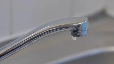Leaking tap slow motion Stock-Footage 99077918