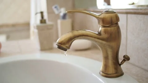 Leaking water tap closeup Stock Footage 76518504