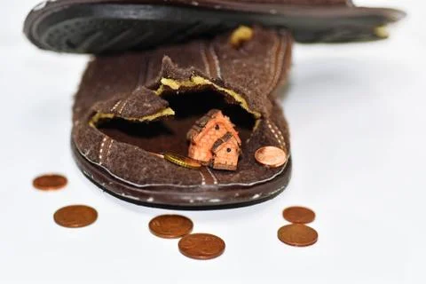 Leaky brown slippers. Stock Photos