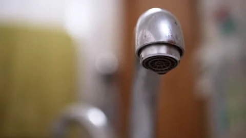 Leaky Faucet Close-Up, Blurred Background Stock Footage 312010767