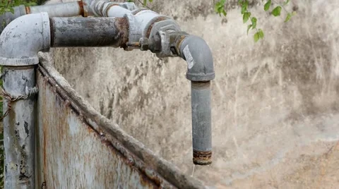 Leaky pipes on a cattle tank Stock Footage 50265226
