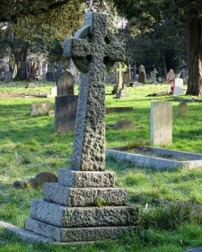 Leaning Celtic Cross In Graveyard Stock Photos