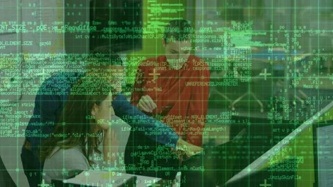 Leaning dev pointing at screen, team reviewing tech code for launch while green Stock Footage 329836103